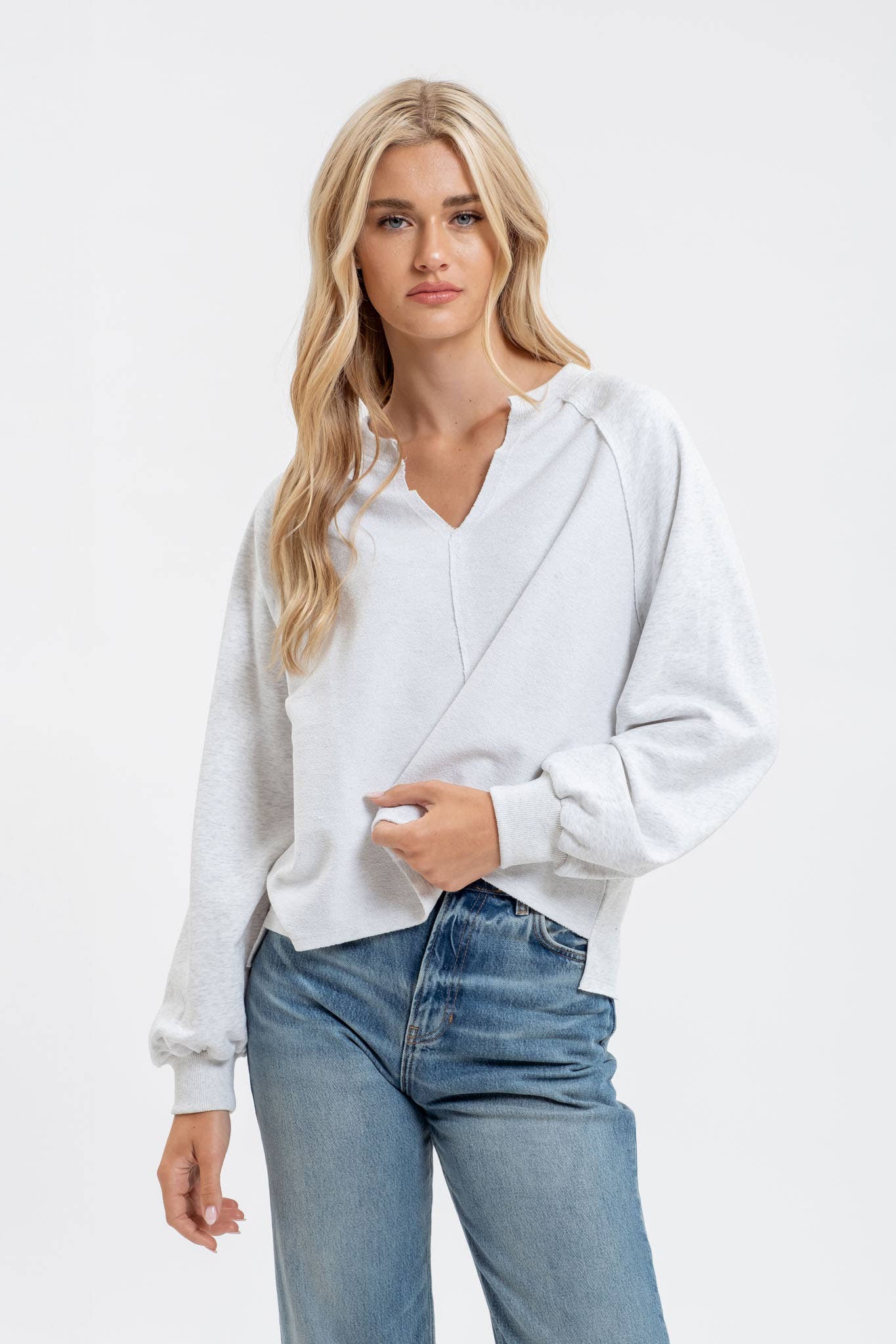 Exposed Threads Knit Top